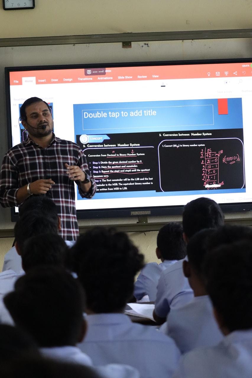 Students in the computer science lab at Chimalgi PU College